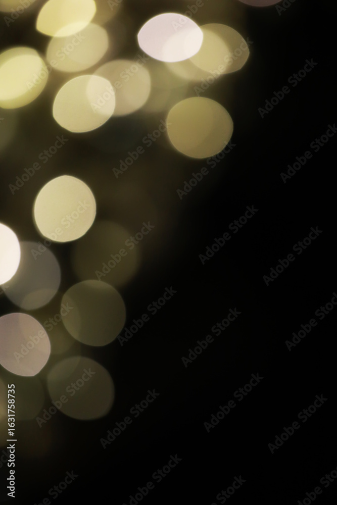 Fototapeta premium Abstract Blurred Bokeh Lights in Dark Background - Soft, Warm, Dreamy Illumination