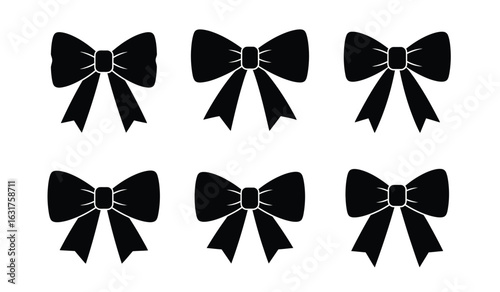 Black Ribbon Collection: A curated assortment of six elegant, black ribbons in a collection of stylish bows for a variety of creative projects, perfect for a touch of sophistication.