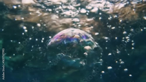 A Large Bubble Rises Through Water