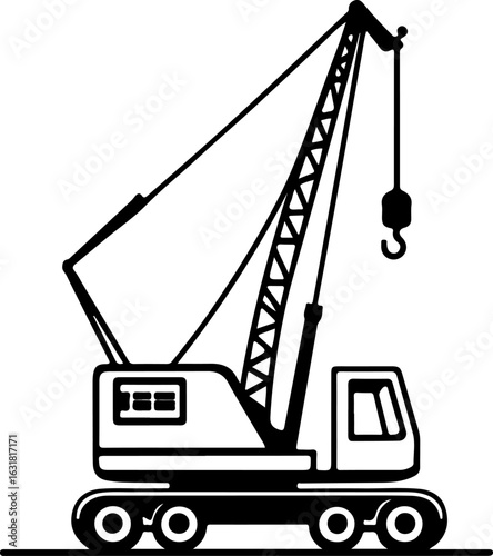 Construction crane lifting cargo at industrial site with clear blue sky silhouette