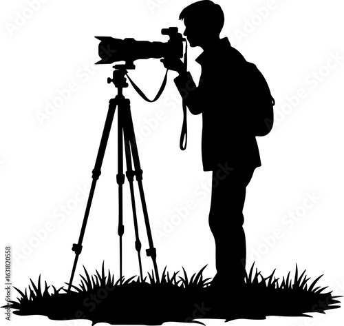 Silhouette of a Photographer with Camera on Tripod in Nature