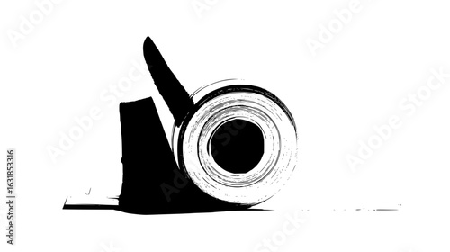 A monochrome image featuring a partially unrolled roll of material with visible layers and shadows cast around it