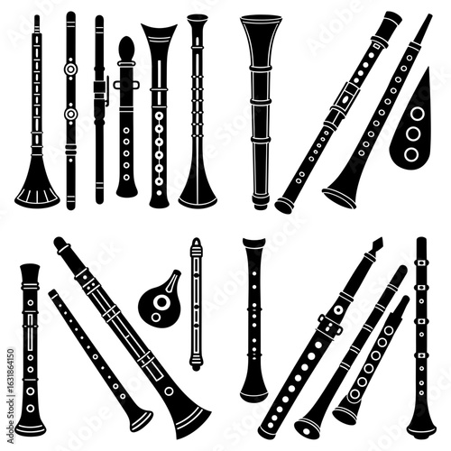 Collection of various black and white wind instruments including clarinets and recorders in a pattern