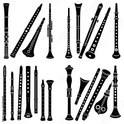 Collection of various black and white wind instruments including flutes and clarinets in different styles