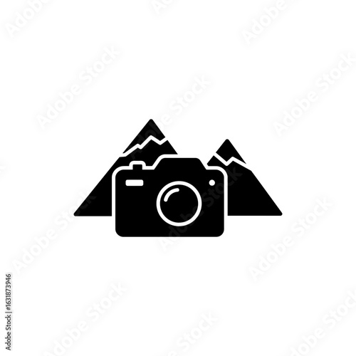Photo camera with mountains black filled icon for travel photography and scenic landscape capture