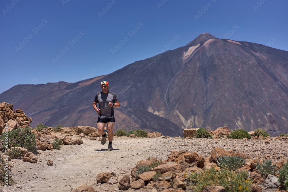 Fototapeta premium Trail runner on Mount Guajara