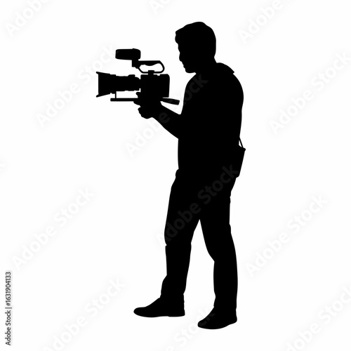 Silhouette of a Videographer with Camera Equipment