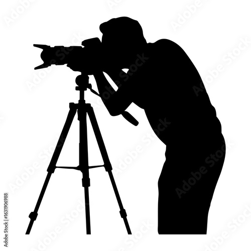 silhouette of a photographer taking a picture