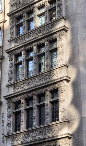 Fotografi Intricate neo-Gothic facade whispers secrets of bygone urban tales, perfect for