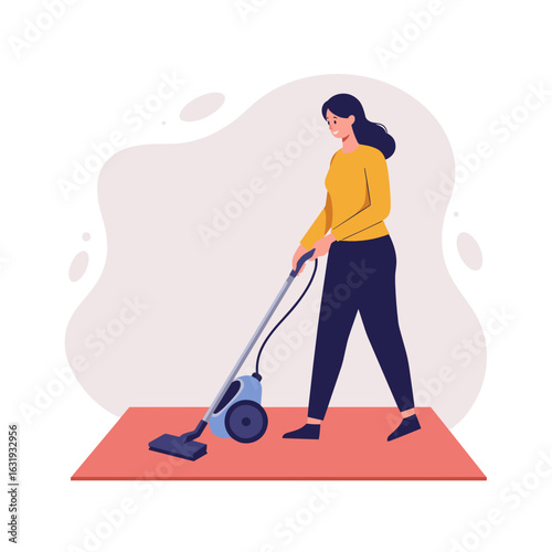 Young woman vacuuming a carpet while cleaning indoors  