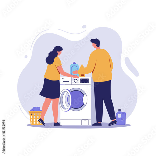 Two people doing laundry together using a washing machine at home  
