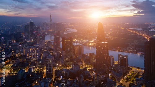 Wallpaper Mural Aerial view of early morning in Ho Chi Minh City, Vietnam with development buildings, transportation, energy power infrastructure. Financial and business centers Torontodigital.ca