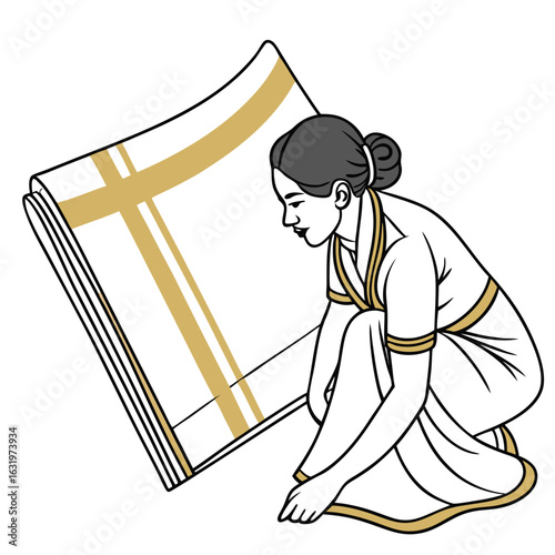 Woman in traditional attire crouching to fold a large white cloth with gold stripes