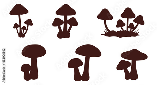A collection of various mushroom shapes and sizes in a dark brown silhouette style. vector design. Silhouette vector design illustration

