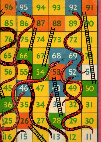 A detail from the vintage board game of snakes and ladders.