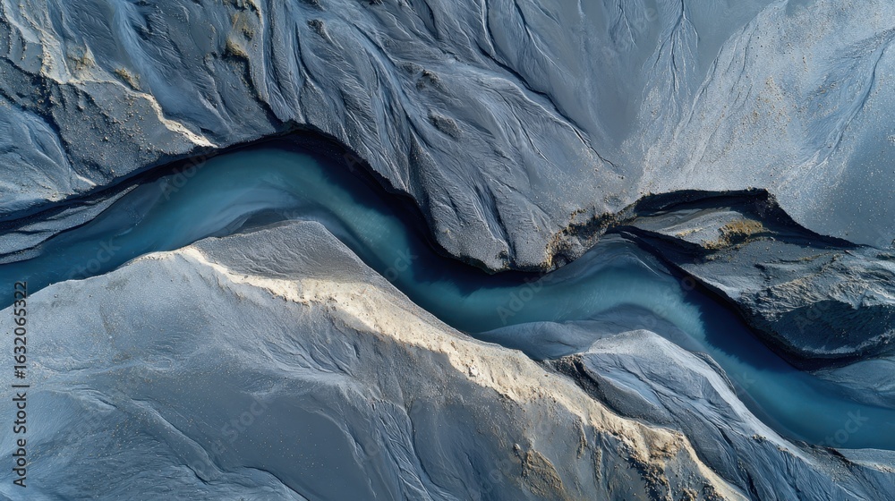 custom made wallpaper toronto digitalRiver's Serenity: An aerial view captures a tranquil, flowing river carving its path through the textured landscape, creating a peaceful and mesmerizing display of natural beauty.