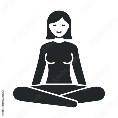 Silhouette of a female figure meditating in lotus position