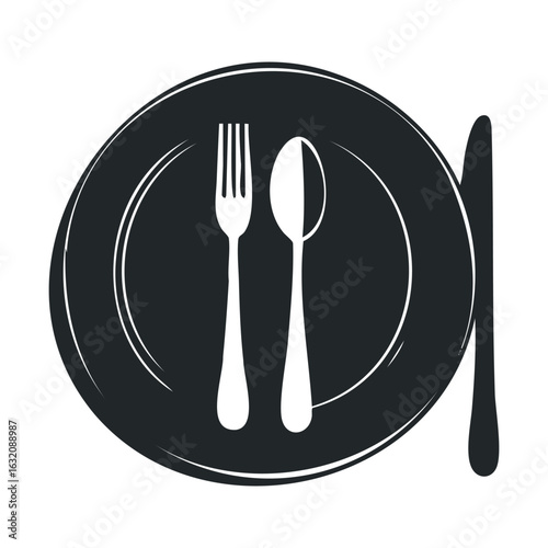 Elegant black and white plate with fork, spoon, and knife
