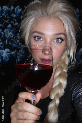 woman with glass of red wine