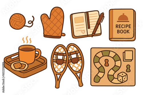 Cozy winter afternoon activities with hot beverage, board games, recipe book, and knitting materials