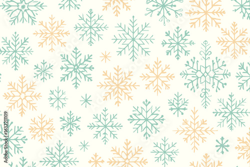 Colorful snowflakes create a festive winter pattern on a light background for seasonal decor