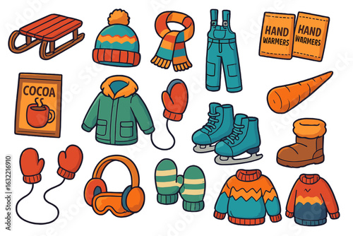 Various winter clothing and accessories laid out on white background for outdoor activities in cold weather