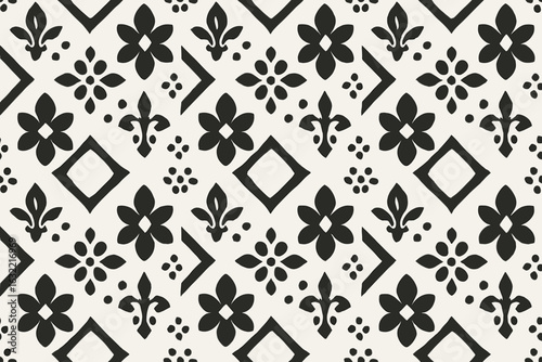 Geometric black and white pattern with floral and diamond shapes on a light background