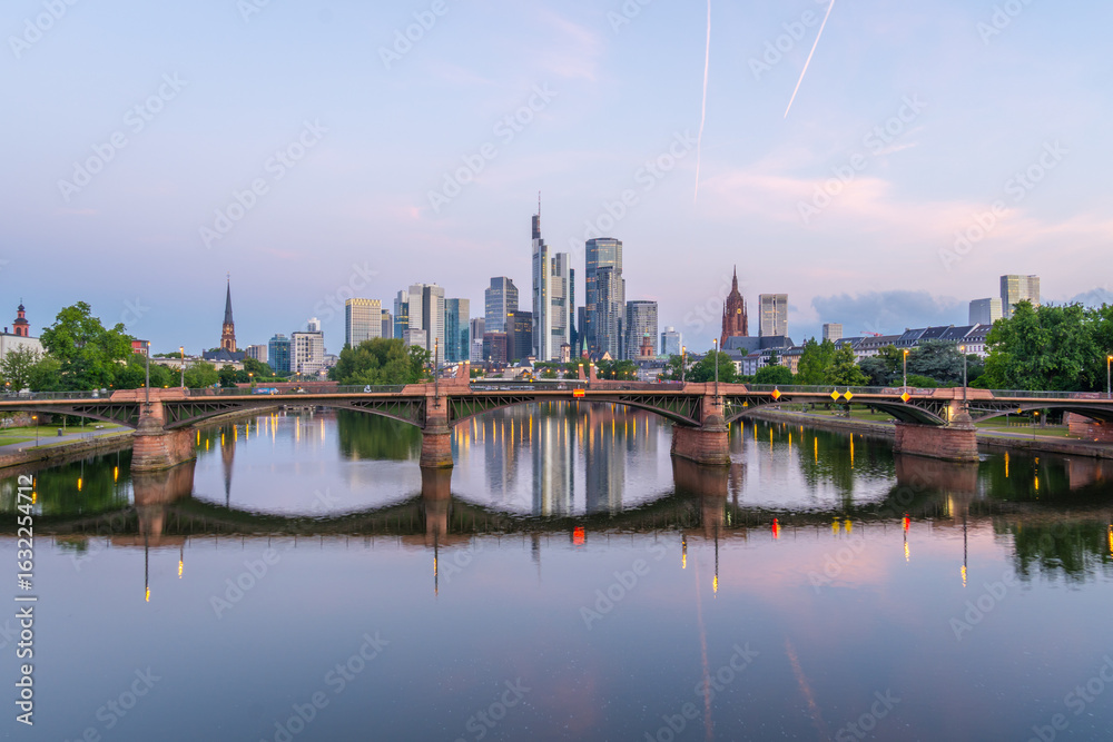 Naklejka premium Frankfurt City Downtown and Main River at Morning Twilight. View From Floserbrucke Bridge. Hesse, Germany