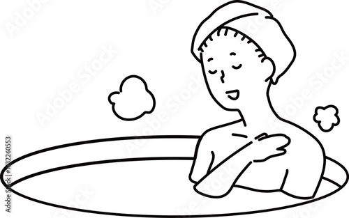 歌を歌う入浴中の女性