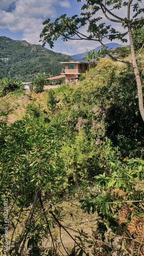 General view of landscape and inside small village with small houses and organized sporadically