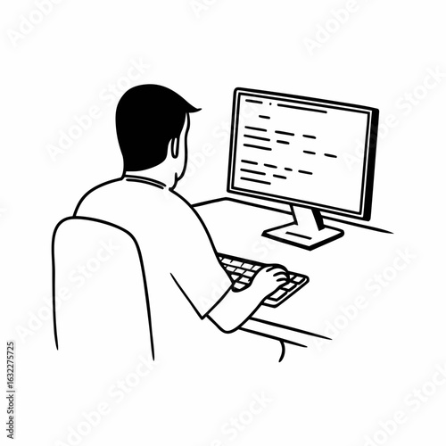 Focused programmer intently typing code on desktop computer at desk