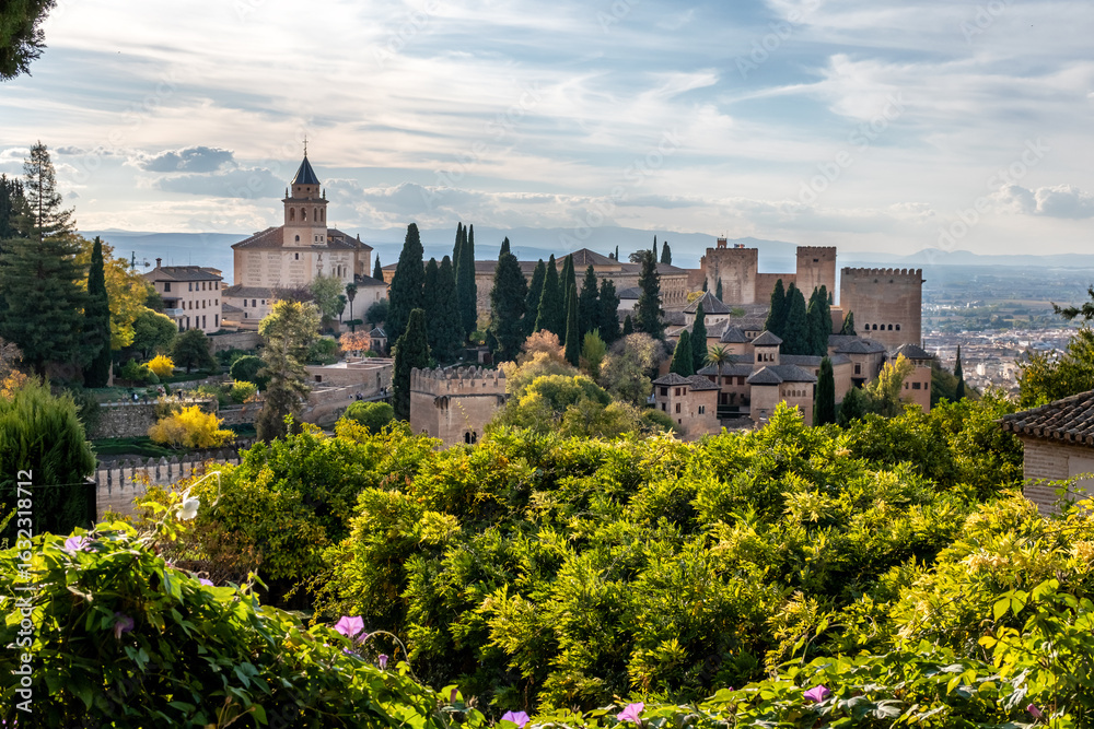 Naklejka premium The watchtowers of the Alhambra, seen from the way to the Generalife. Alhambra, Granada, Spain