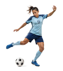 Athletic female soccer player in full kick motion on isolated background