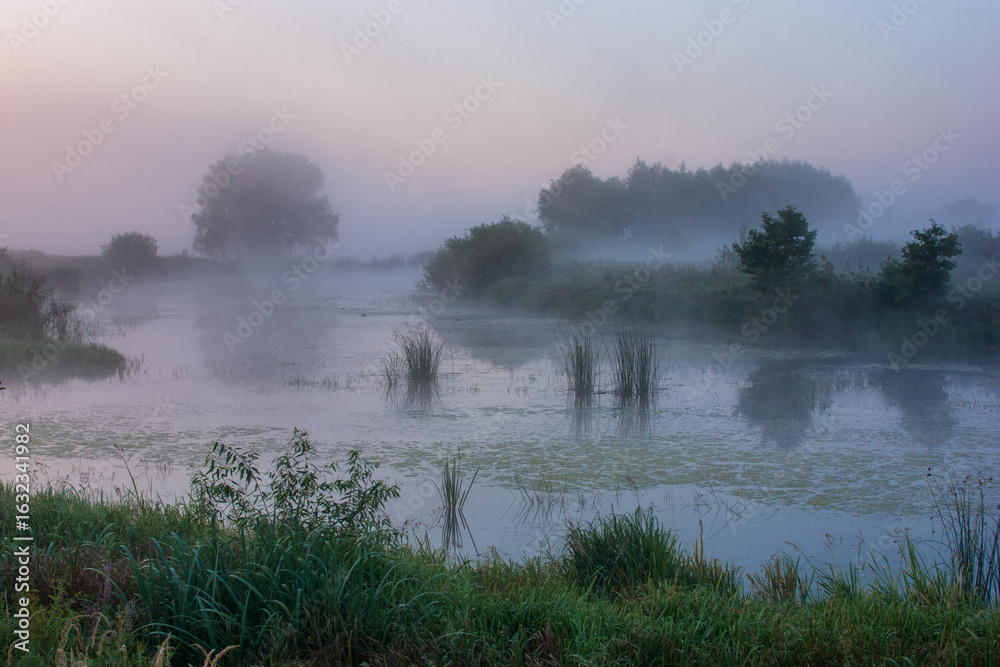 Fototapeta premium morning mist over the river