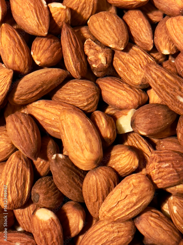 Fototapeta premium A background of roasted almonds