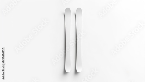 Two white ski poles on white background