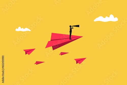 Businessman holding telescope on paper plane. concept of business vision, leadership, future, progress, strategy, motivation, ambition, and achievement