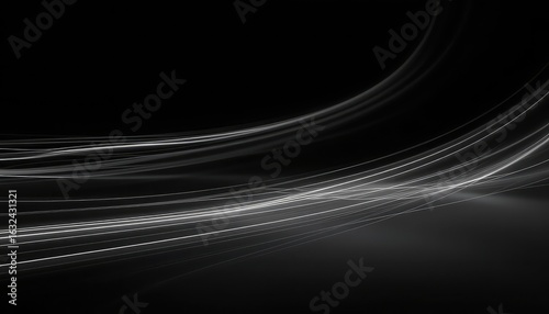 Elegant white light streaks create a sense of flow and movement against a dark grey backdrop