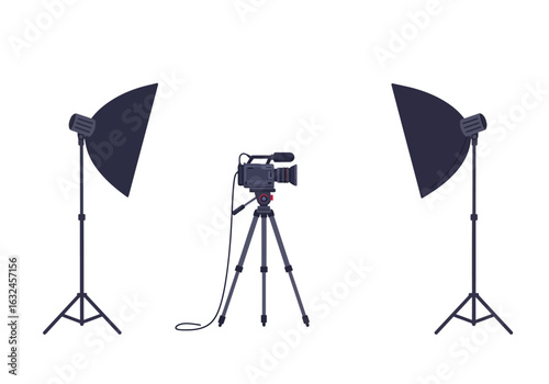 Camera on tripod flanked by two studio lights indoor setup for video recording