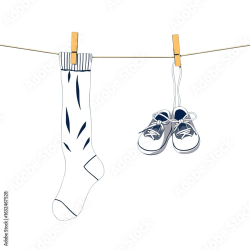 Athletic socks hanging with baby shoes