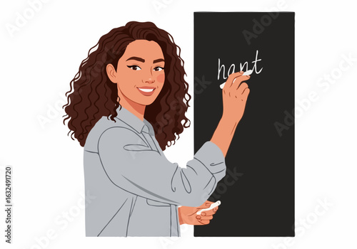 A smiling young woman teacher with a friendly mood writing on a chalkboard representing education and learning.