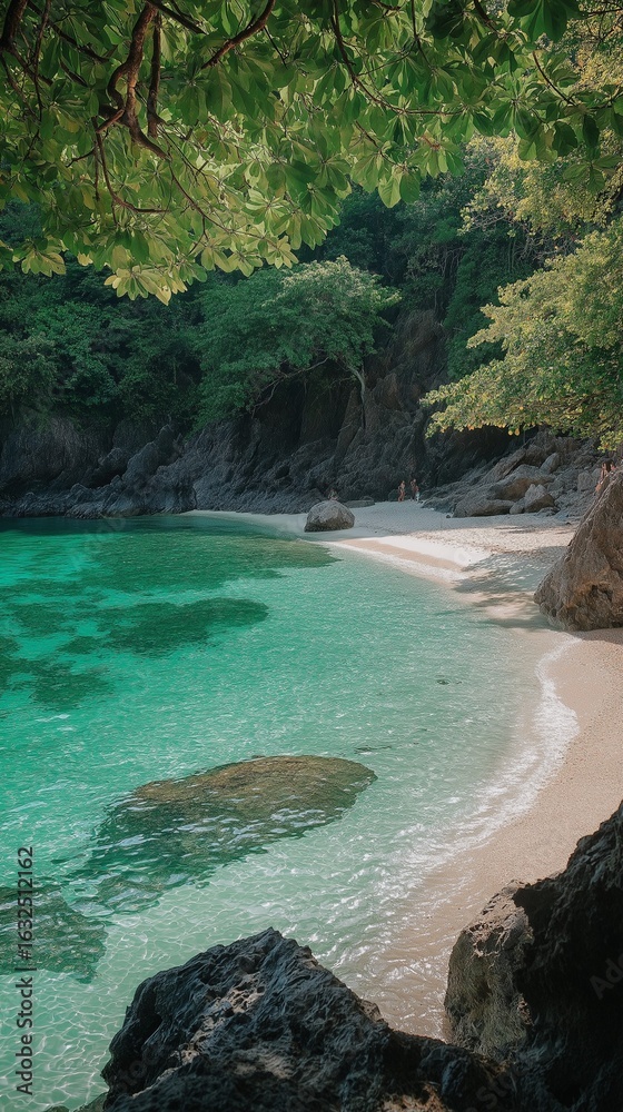 Fototapeta premium Calm waters gently lap the shore, surrounded by vibrant green foliage and rocky formations