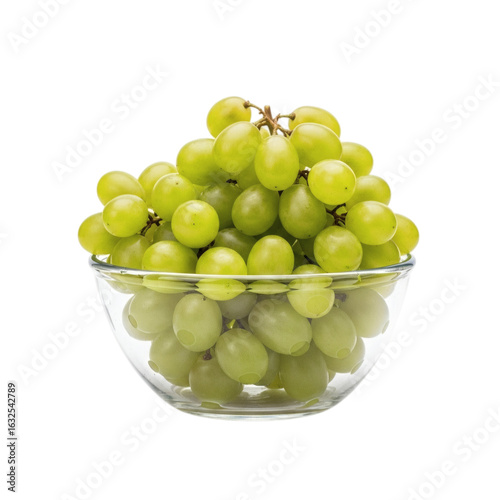 Fresh green grapes in a clear glass bowl on a black background