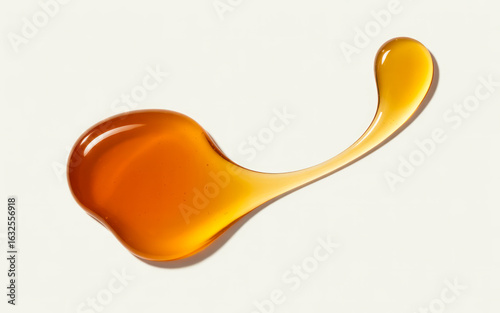 Amber Honey Drip Swirl On White Background sweet liquid