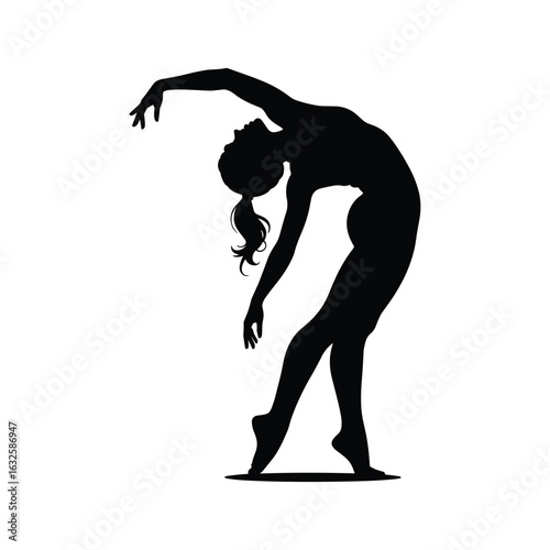 Silhouette of a graceful dancer in a dramatic pose