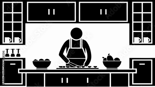 Person in apron preparing food at kitchen counter with cabinets and bowls of fruit in black and white silhouette