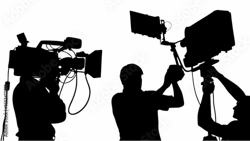 Silhouette of cameramen operating professional video cameras with lights on tripods in a studio setting