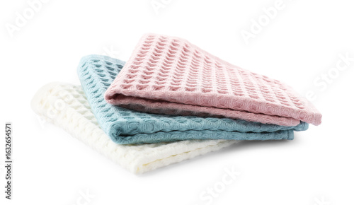 Clean colorful waffle towels isolated on white