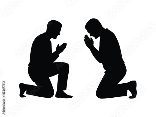 Two men praying kneeling devotion faith