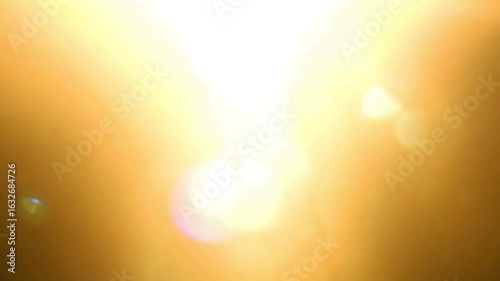 Golden light beam illuminates dark space, creating dynamic and inspiring atmosphere video background